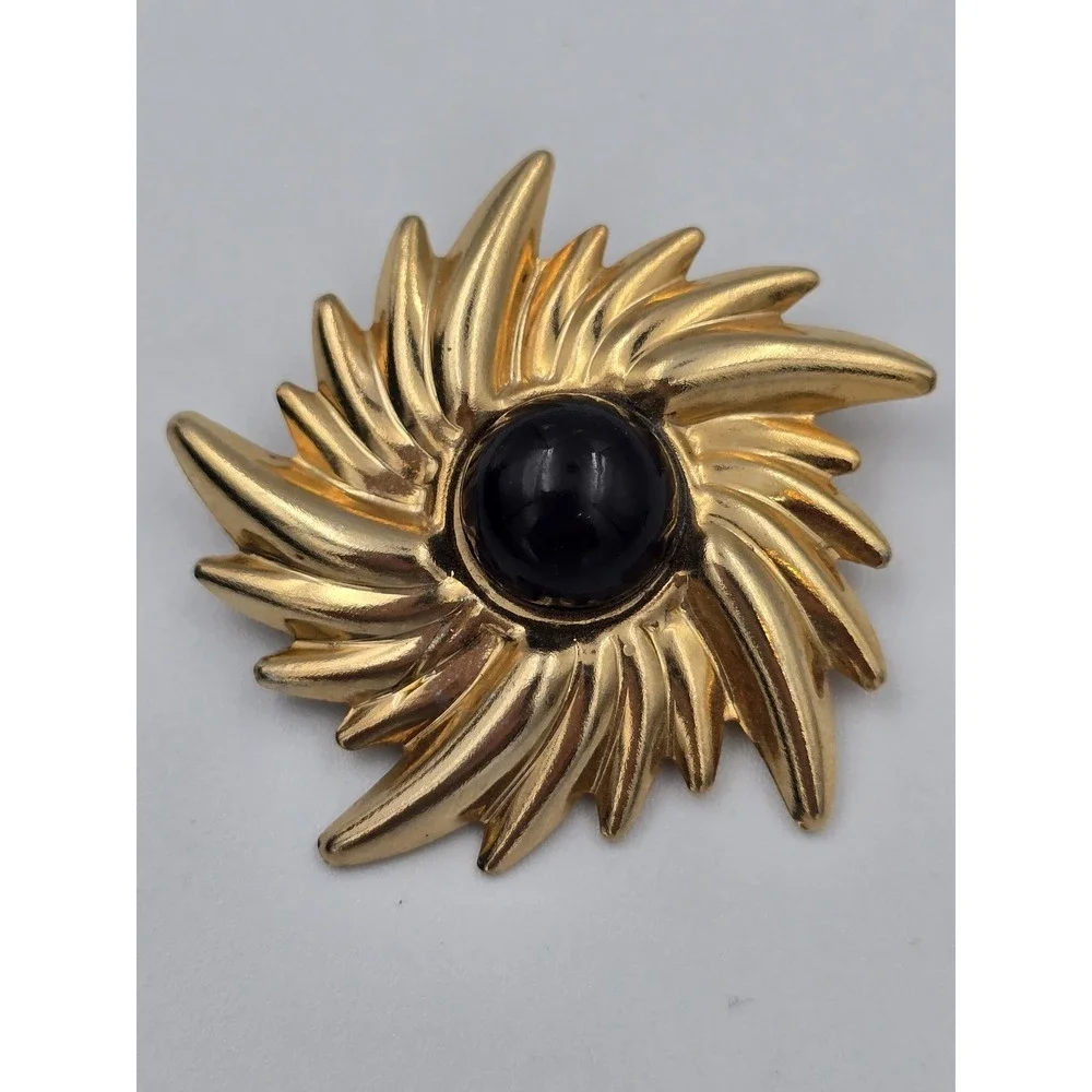 Vintage Gold Tone Swirl Sunburst Brooch Pin with Black Cabochon Center 1980s 90s